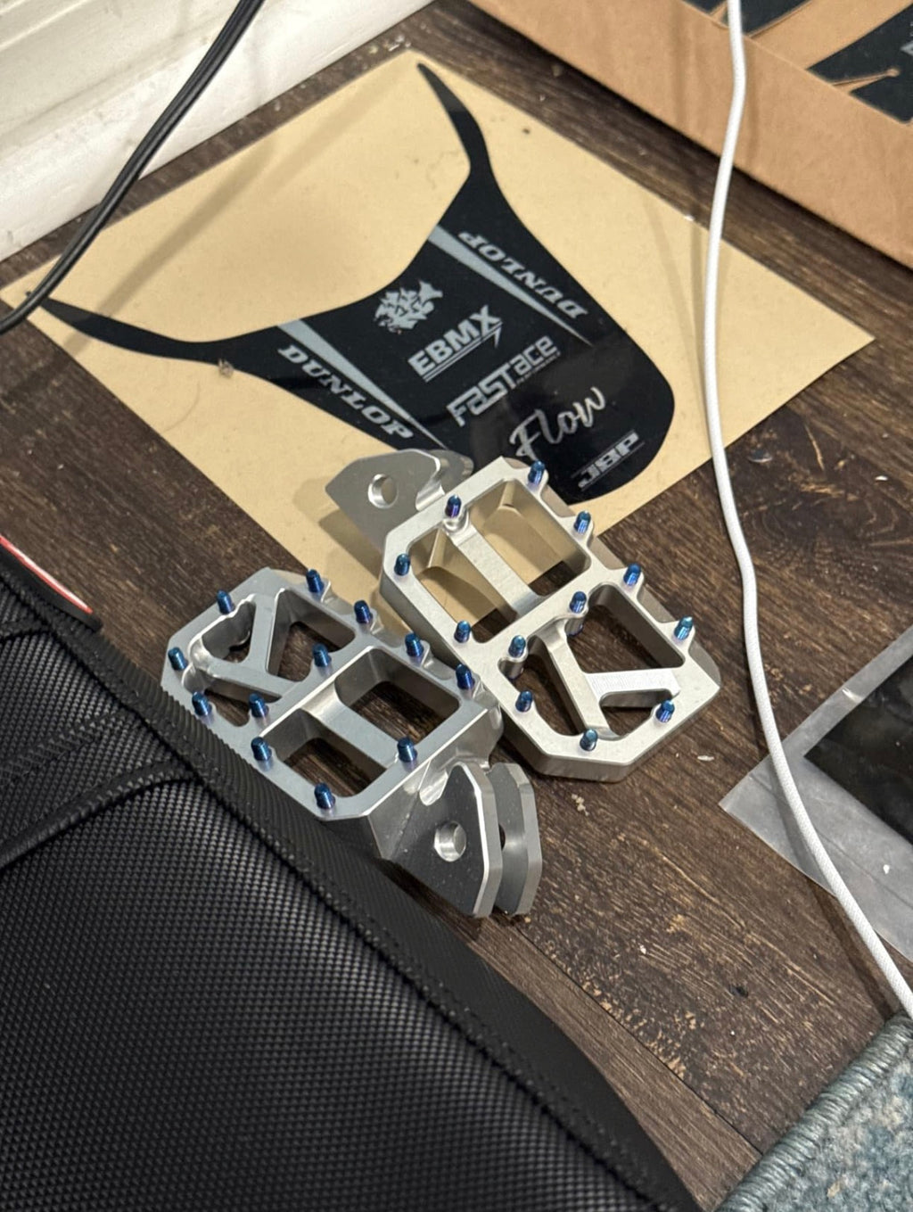 Cnc aluminum foot pegs for e motos fits basically every bike
