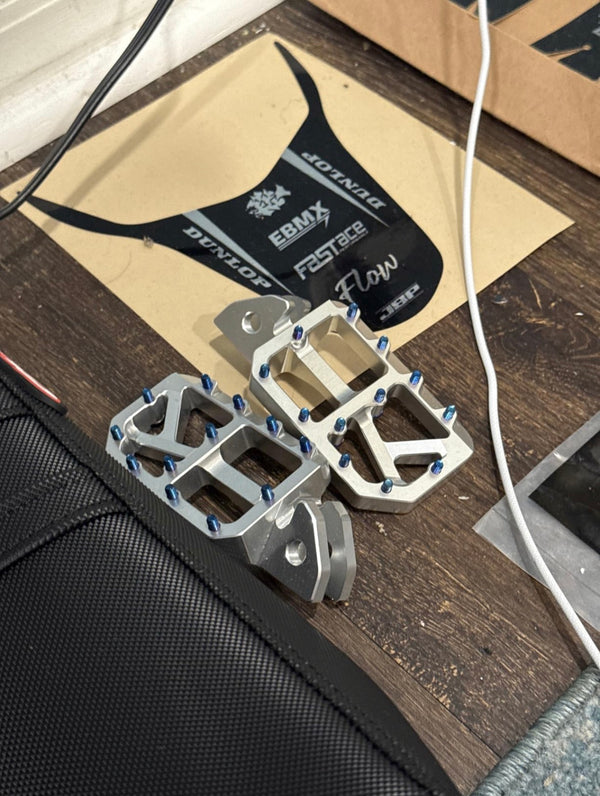 Cnc aluminum foot pegs for e motos fits basically every bike